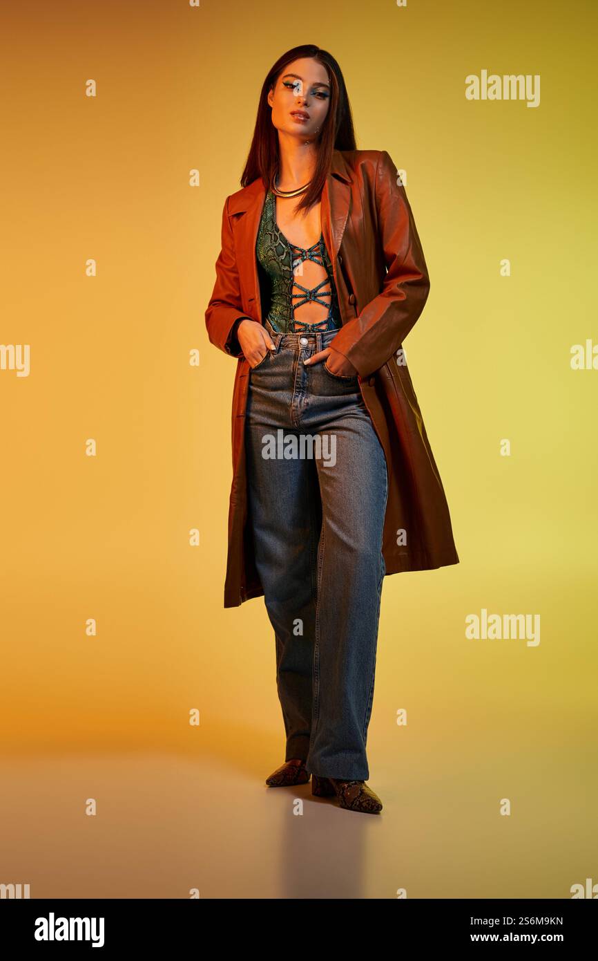 A beautiful young woman showcases her trendy snake print outfit amid a