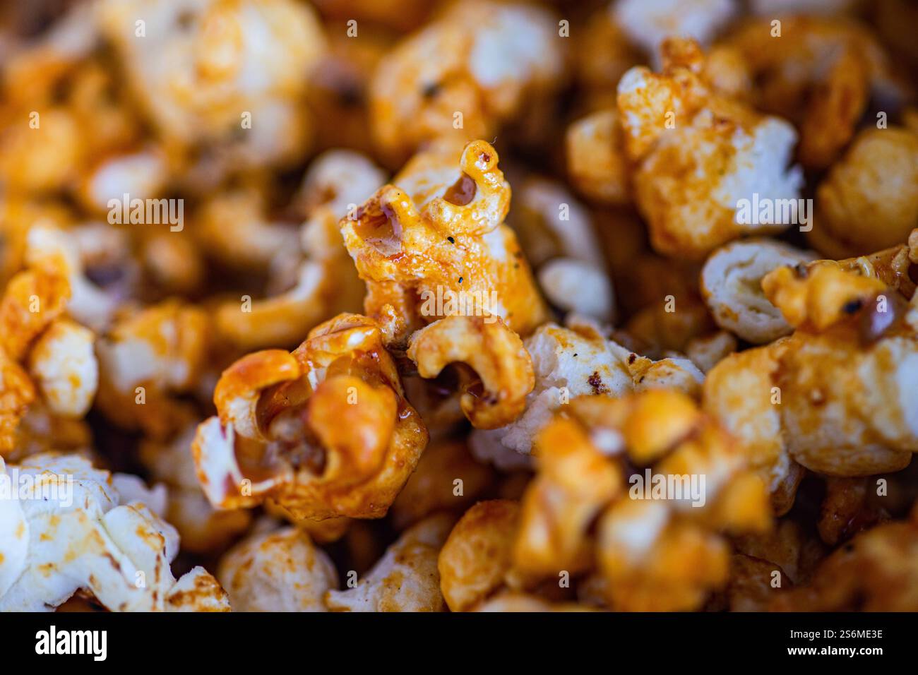 Sweet caramel popcorn in the bowl ready for movie watching Stock Photo
