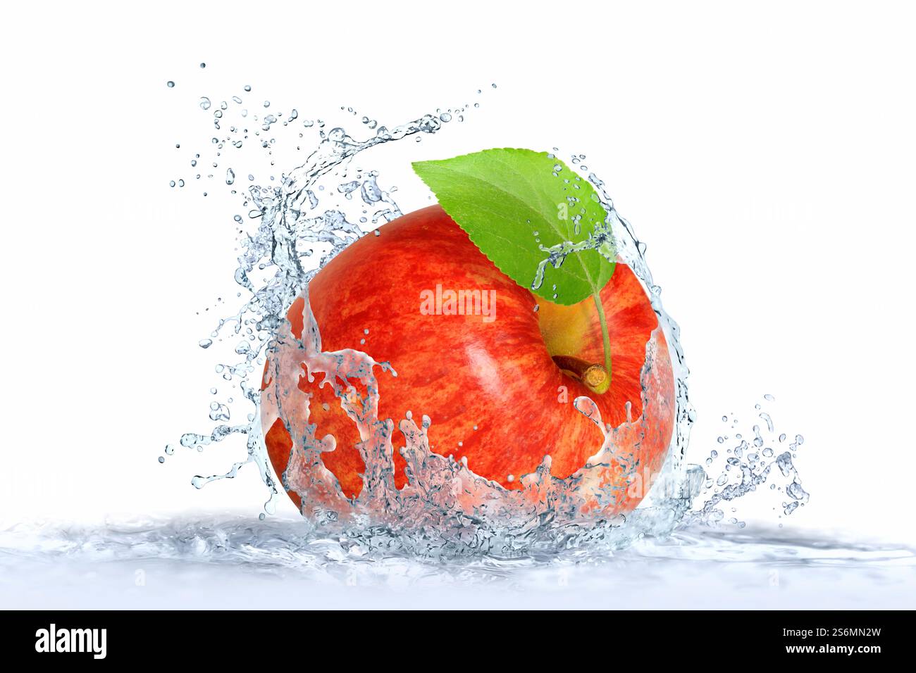 Apple falls into water Stock Photo