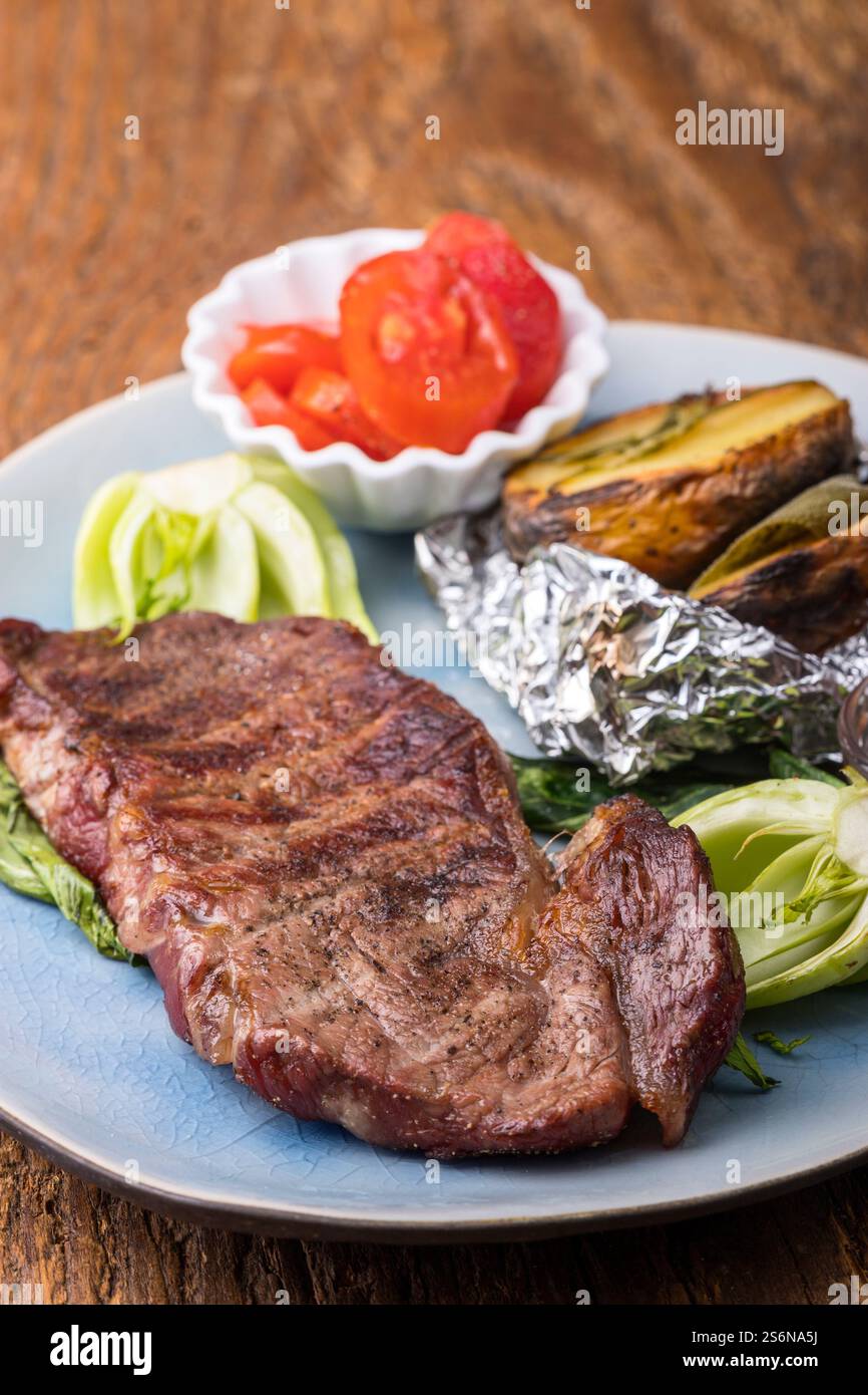 Steak with baked potato hi-res stock photography and images - Alamy