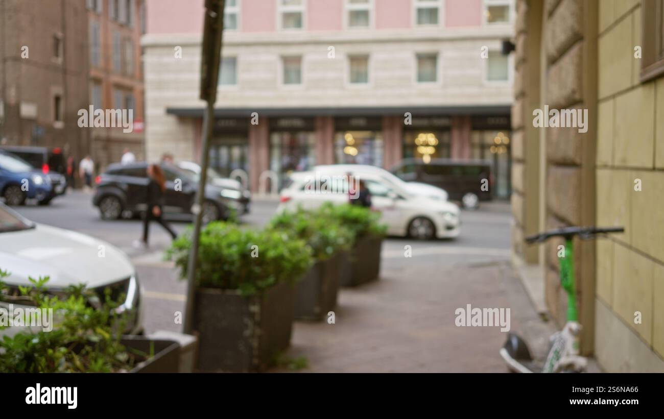 Blurred street in rome with cars and pedestrians creating a bokeh ...