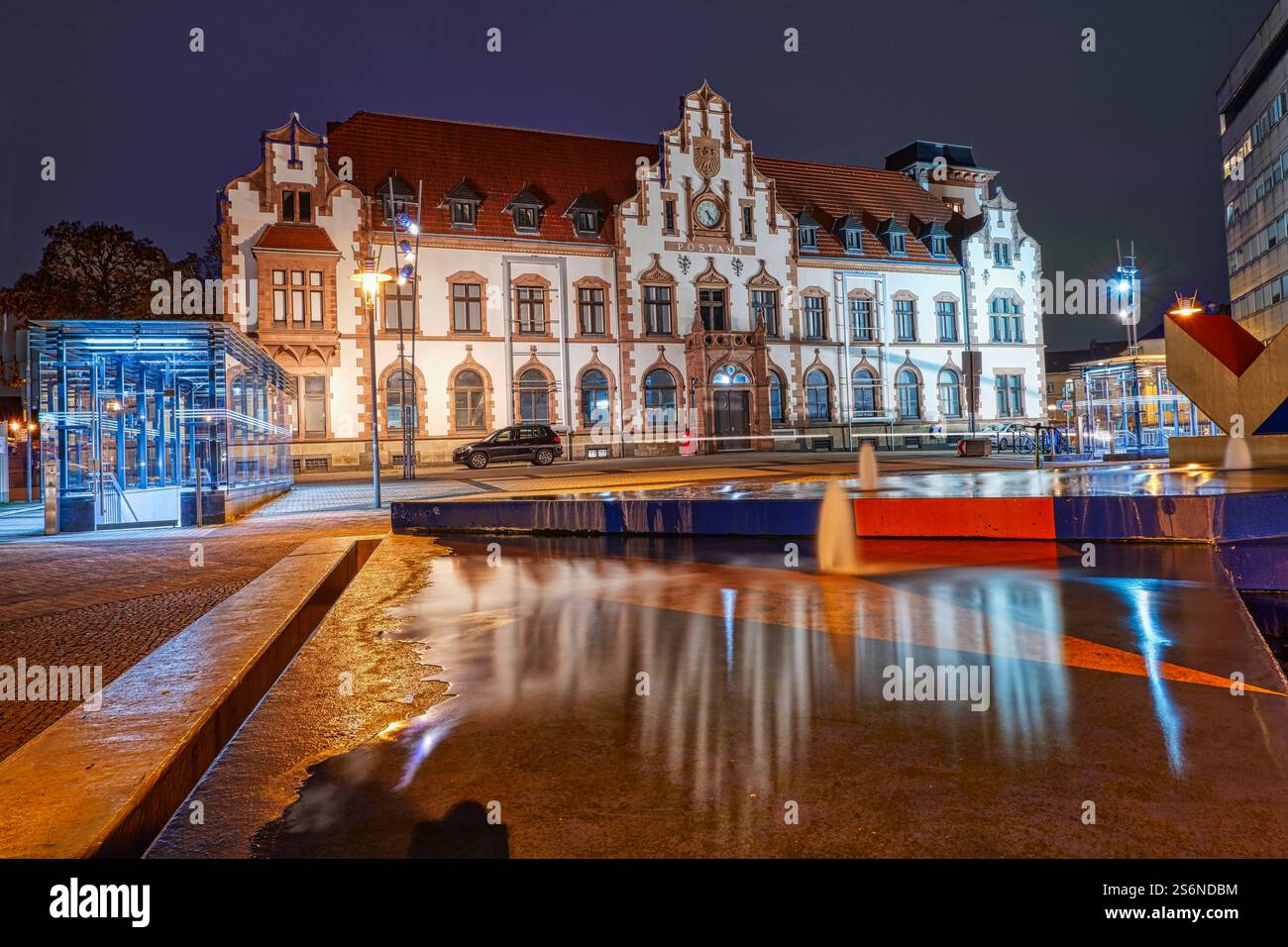 Historic post office building and colorful fountain in Mülheim an der Ruhr Stock Photo