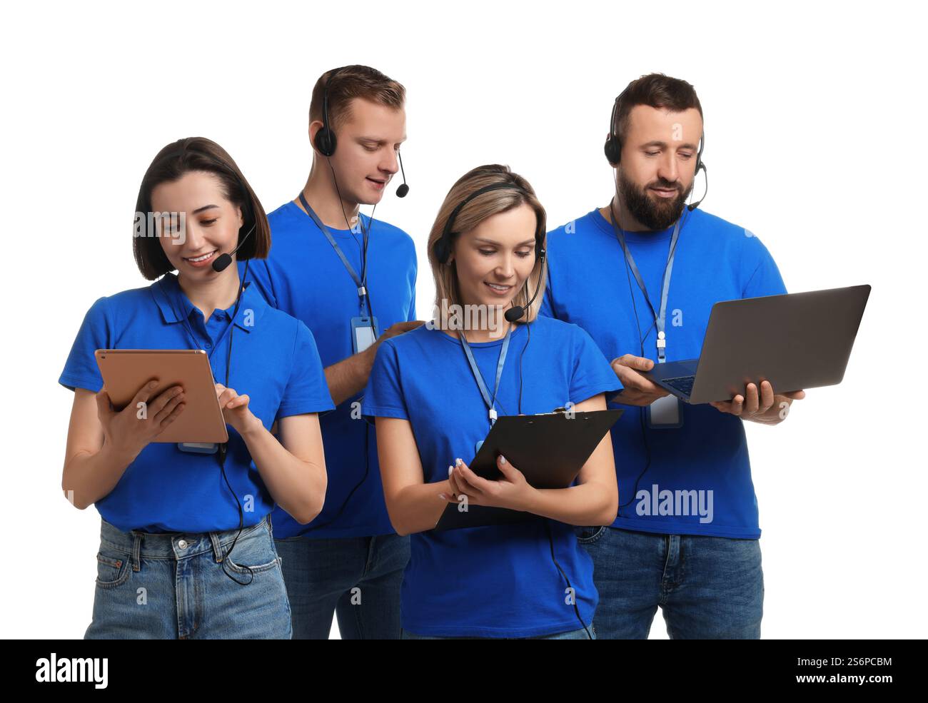 Phone Tech Team Technical support call center. Team of friendly operators working on ...