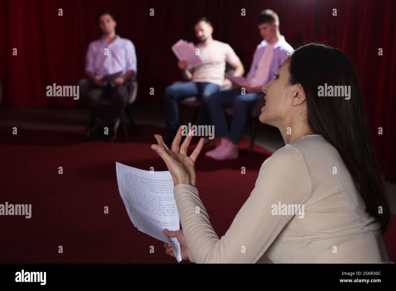 Performer With Script Professional actors with their scripts rehearsing in theatre Stock ...