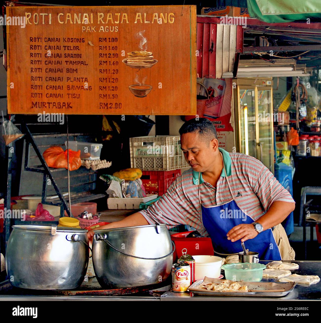 Steling Roti Man selling Malay street food including Roti Canai and Murtabak in Chow ...