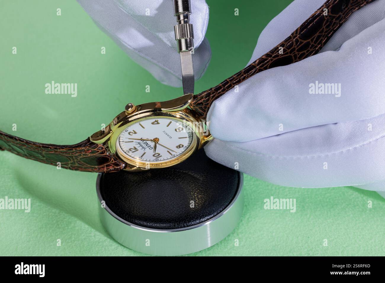 Watchmaker Spring Watchmaker removing the watch pins 'spring bar' with the help of the ...