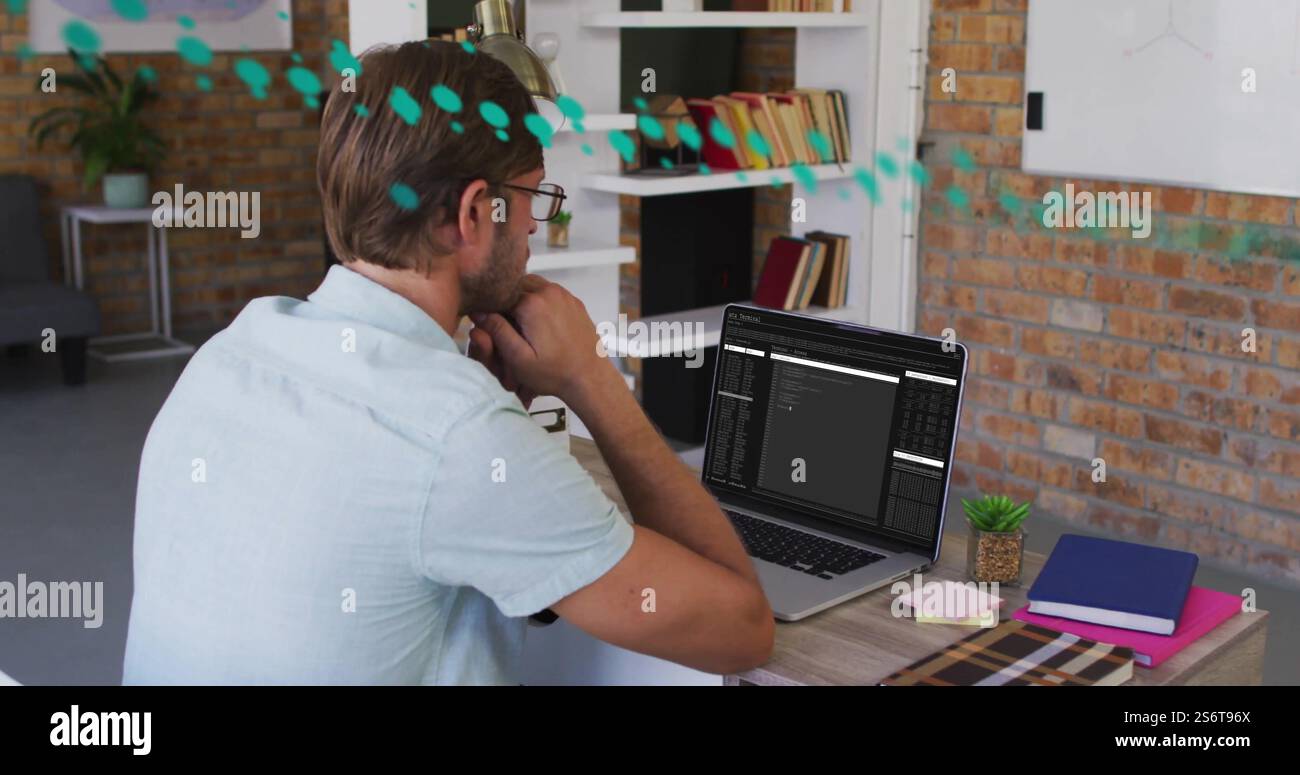 Image of data processing over caucasian businessman using laptop Stock Photo