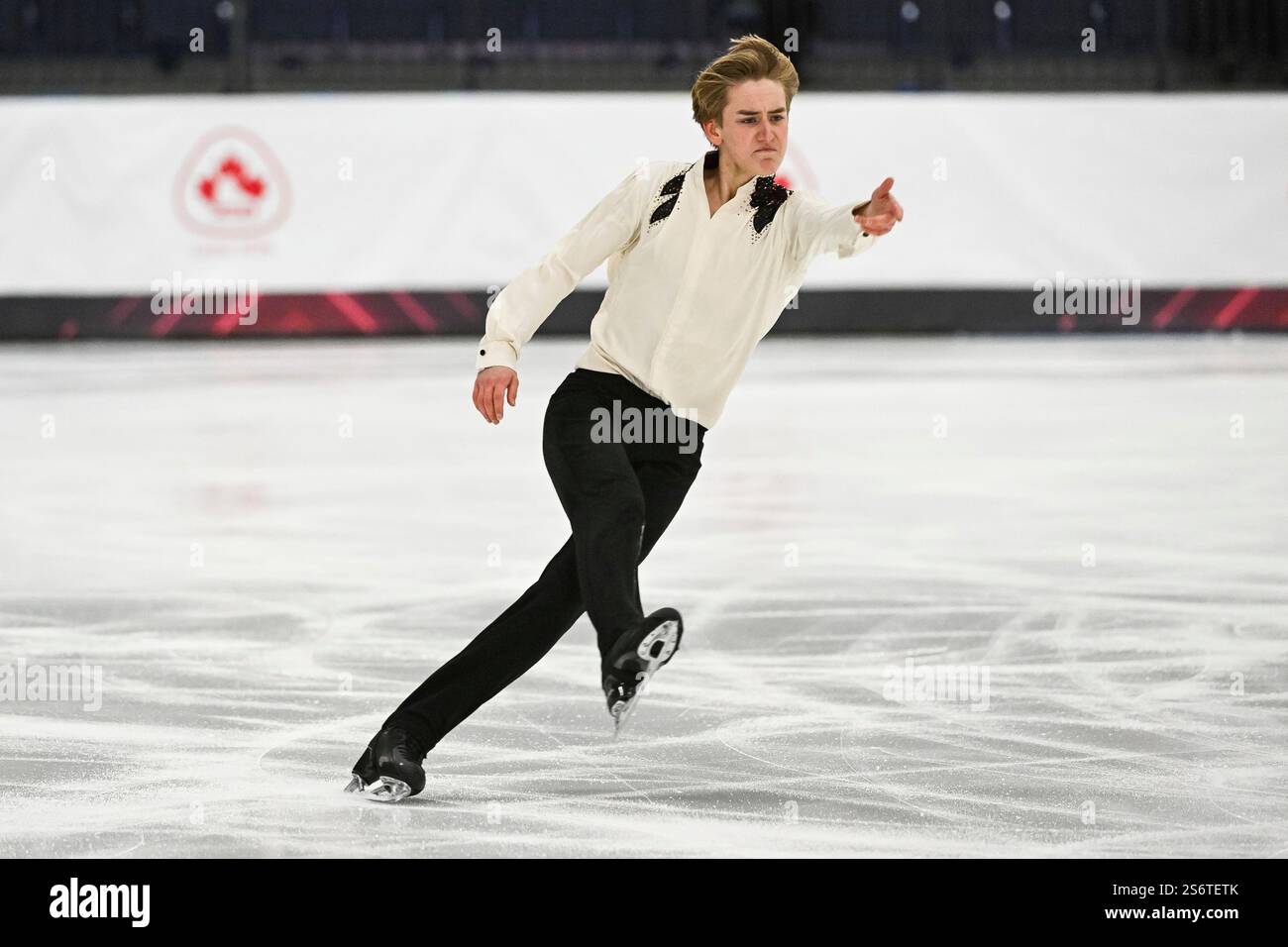 LAVAL, QC - JANUARY 17: Grayson Long (CAN) performs in the men short ...