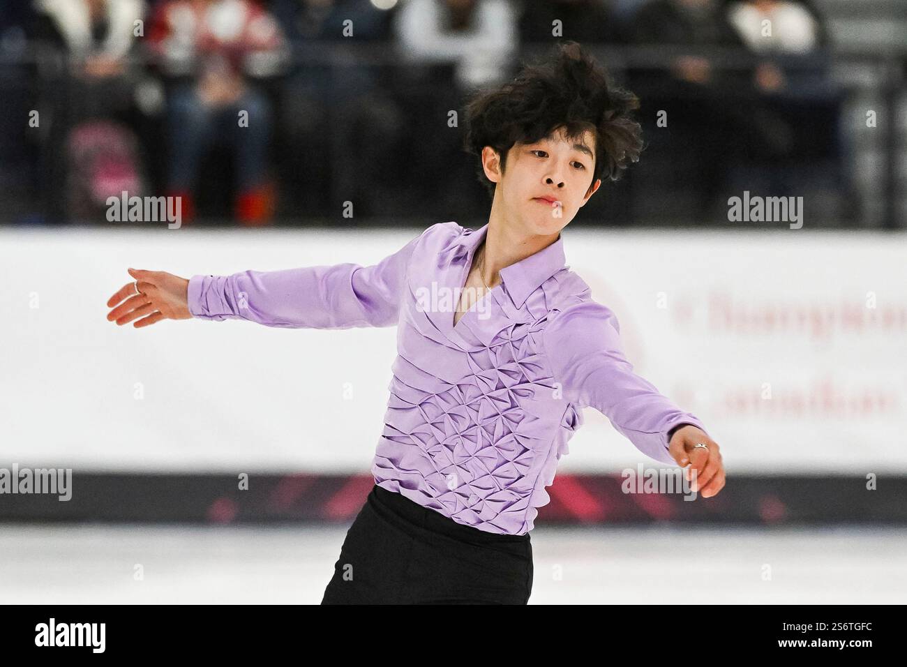 LAVAL, QC - JANUARY 17: David Li (CAN) performs in the men short ...