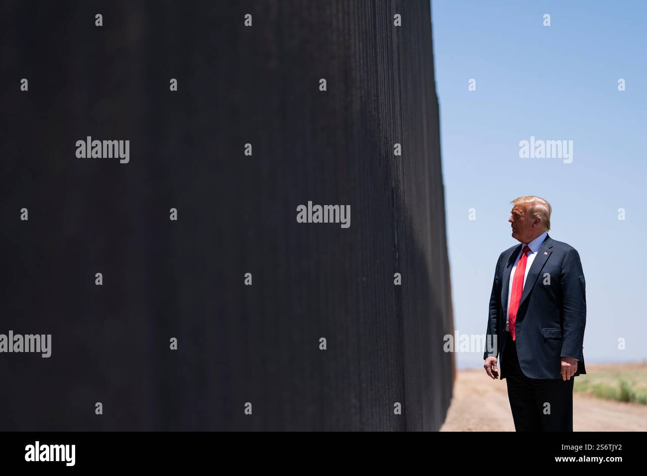 FILE - President Donald Trump tours a section of the border wall in San ...
