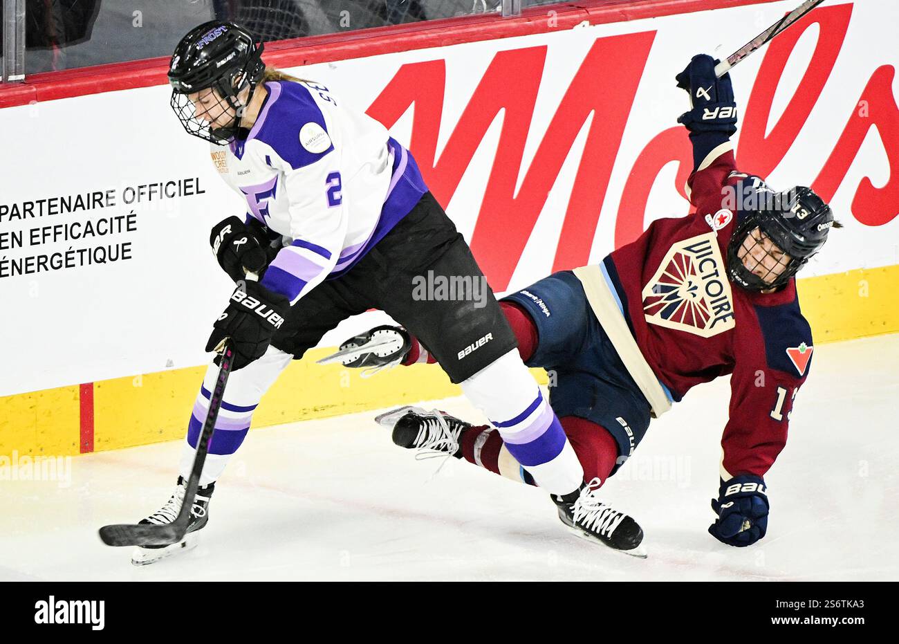 Montreal Victoire's Alexandra Labelle (13) collides with Minnesota ...