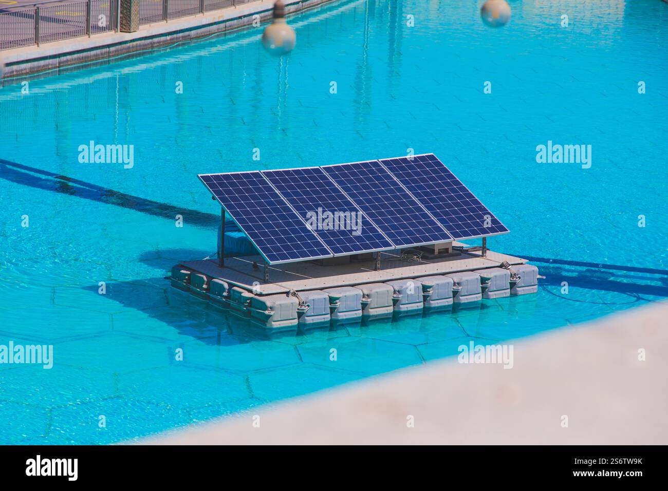 Solar panels on a raft in a pond Stock Photo - Alamy