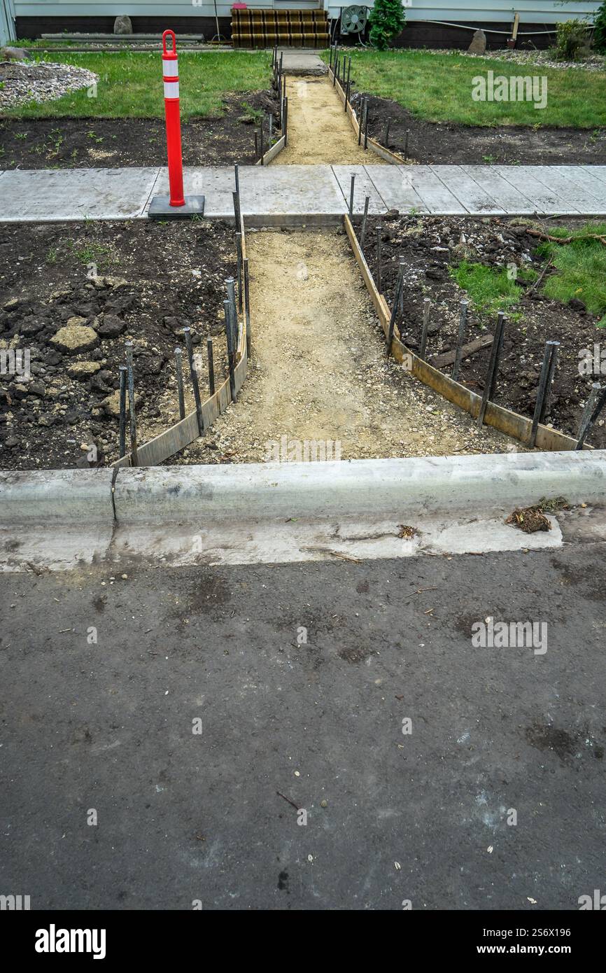 Construction of concrete path leading to house front door Stock Photo ...