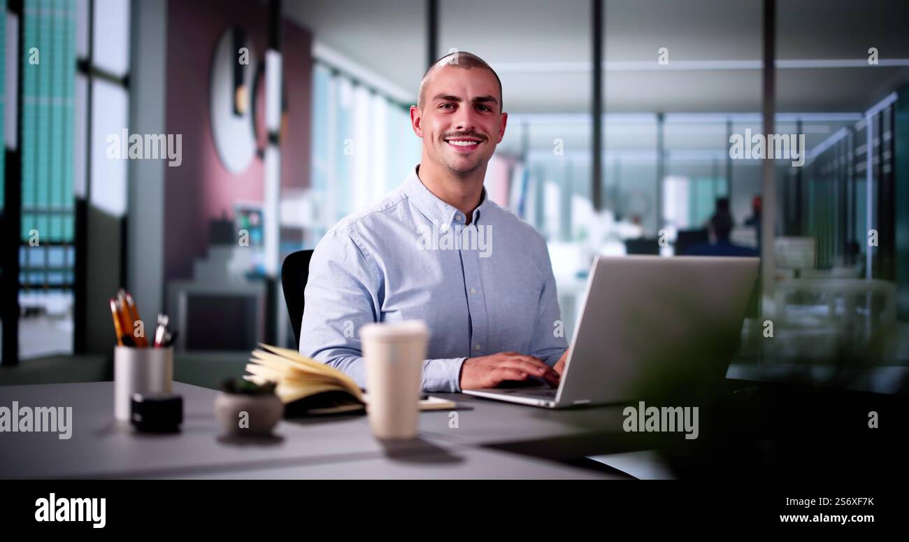 Happy Professional Man Employee Using Computer For Work Stock Photo