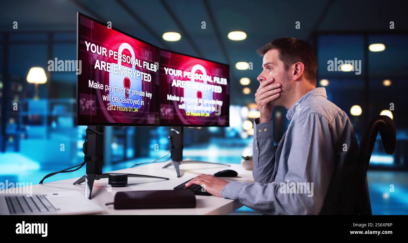 Ransomware Malware Cyber Attack On Business Computer Stock Photo