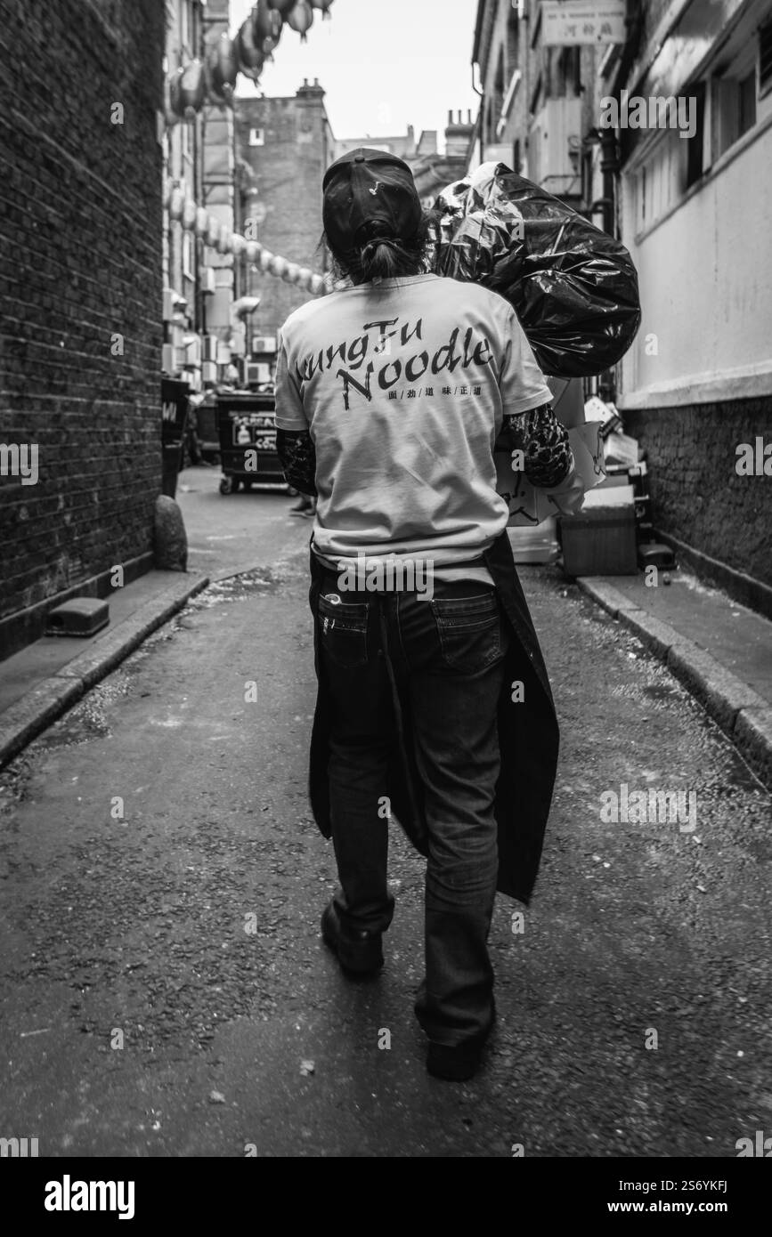 Sanitation worker garbage Black and White Stock Photos & Images - Alamy