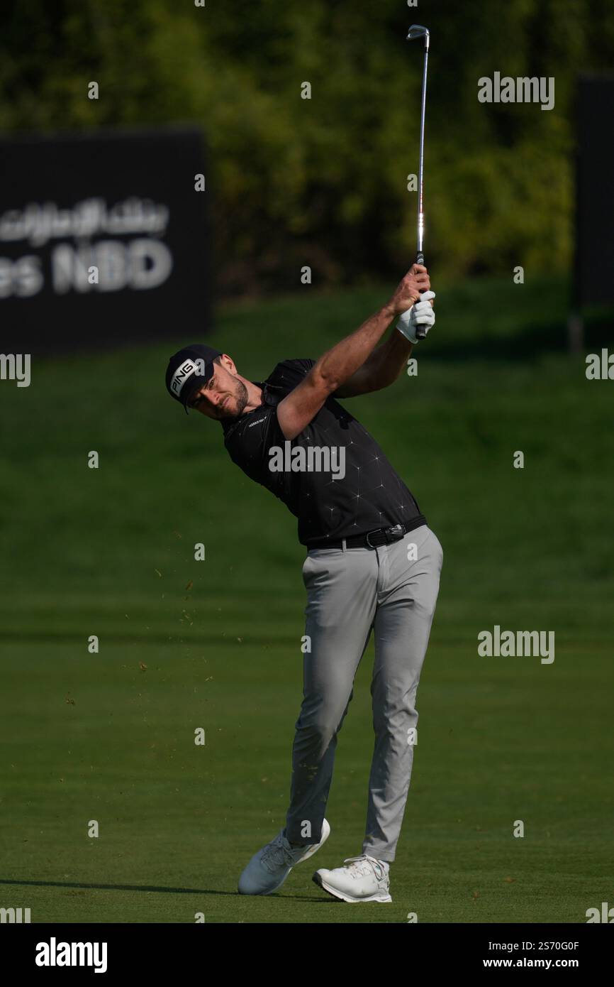 Laurie Canter of England plays his second shot on the 9th hole during