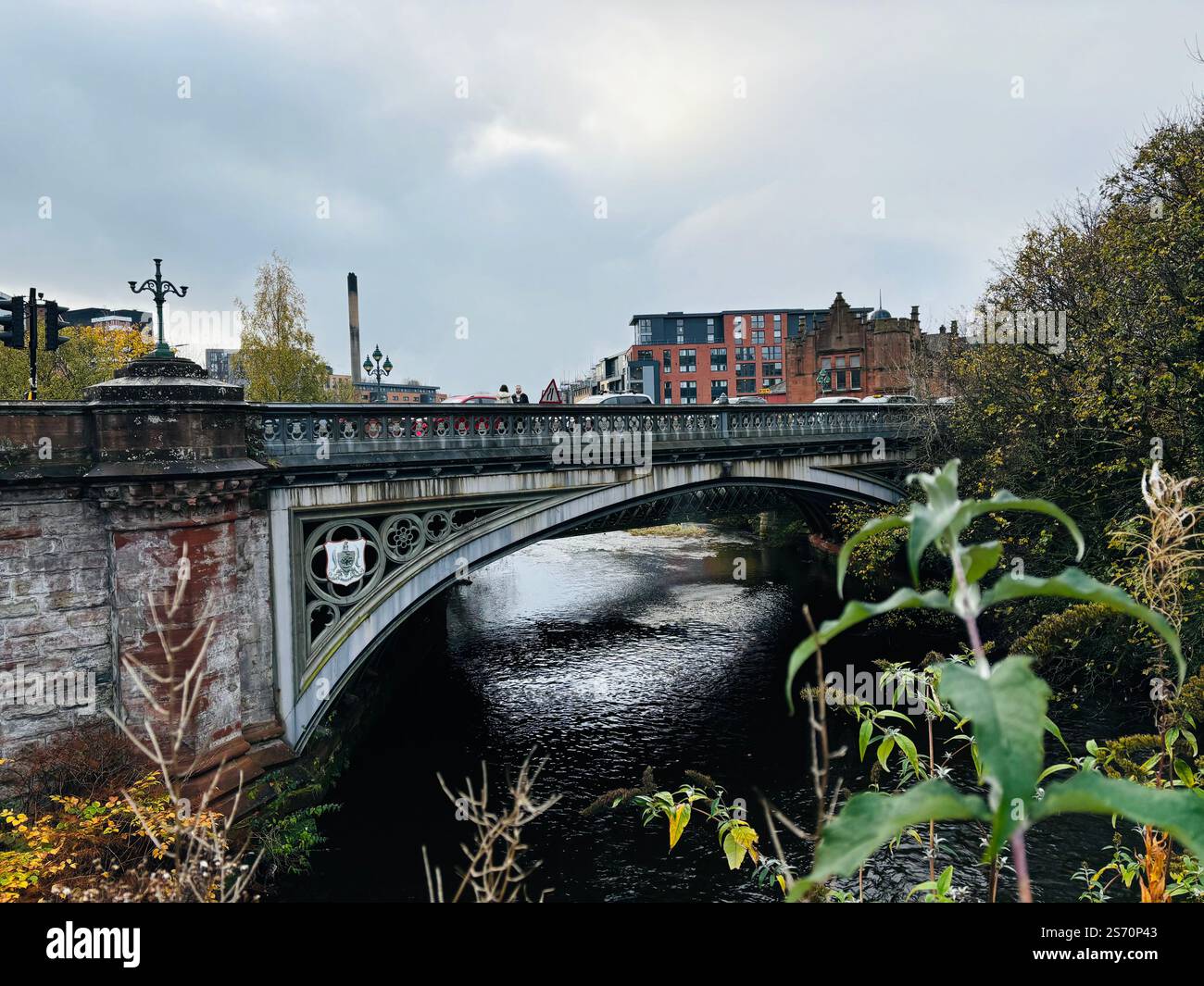 Kelvin Bridge spanning the River Kelvin in Glasgow, Scotland, with a moody autumnal atmosphere. - Smartphone Captured Stock Image