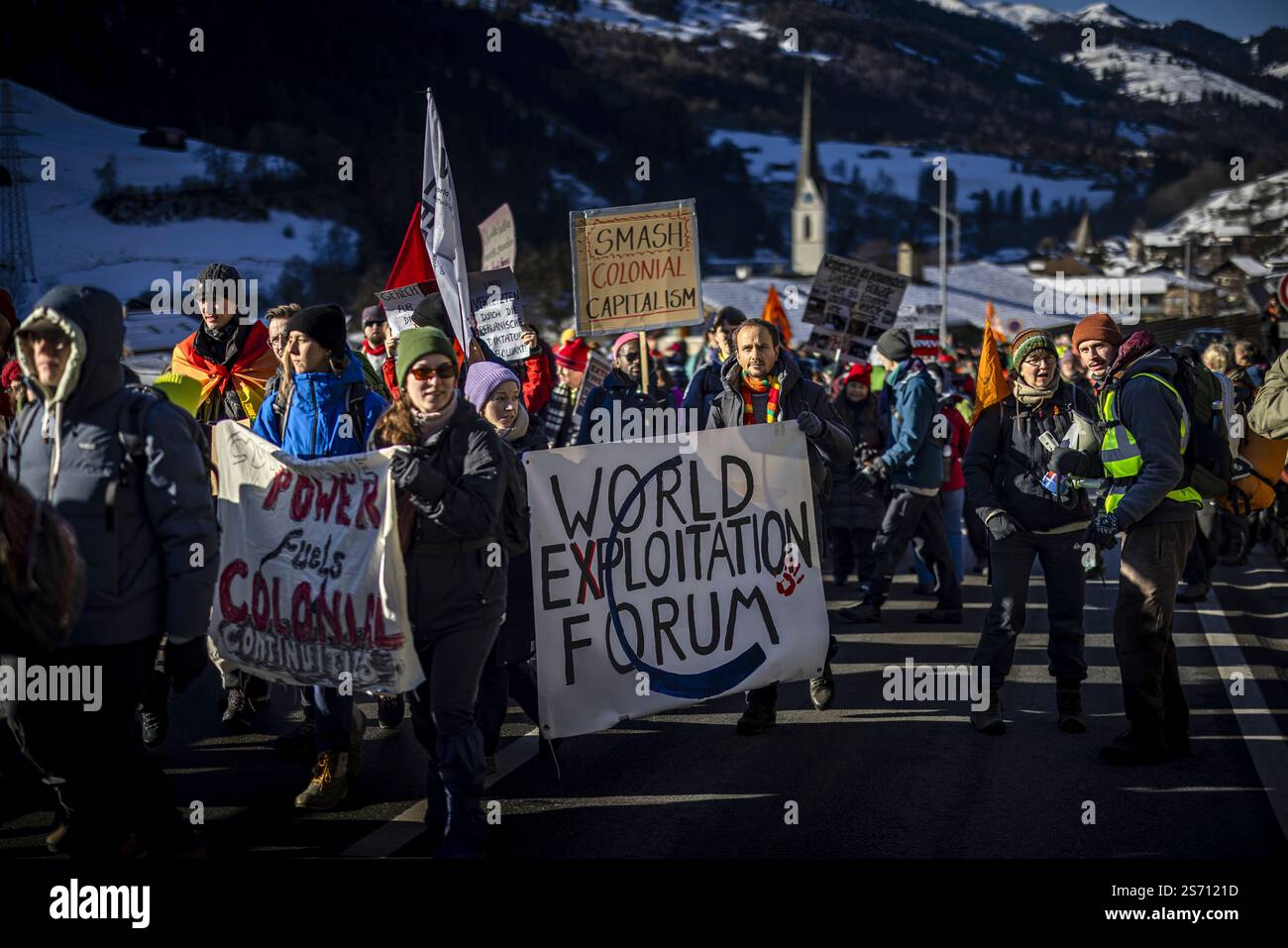 Protestors attend a twoday hike from Kueblis to Davos as part of a