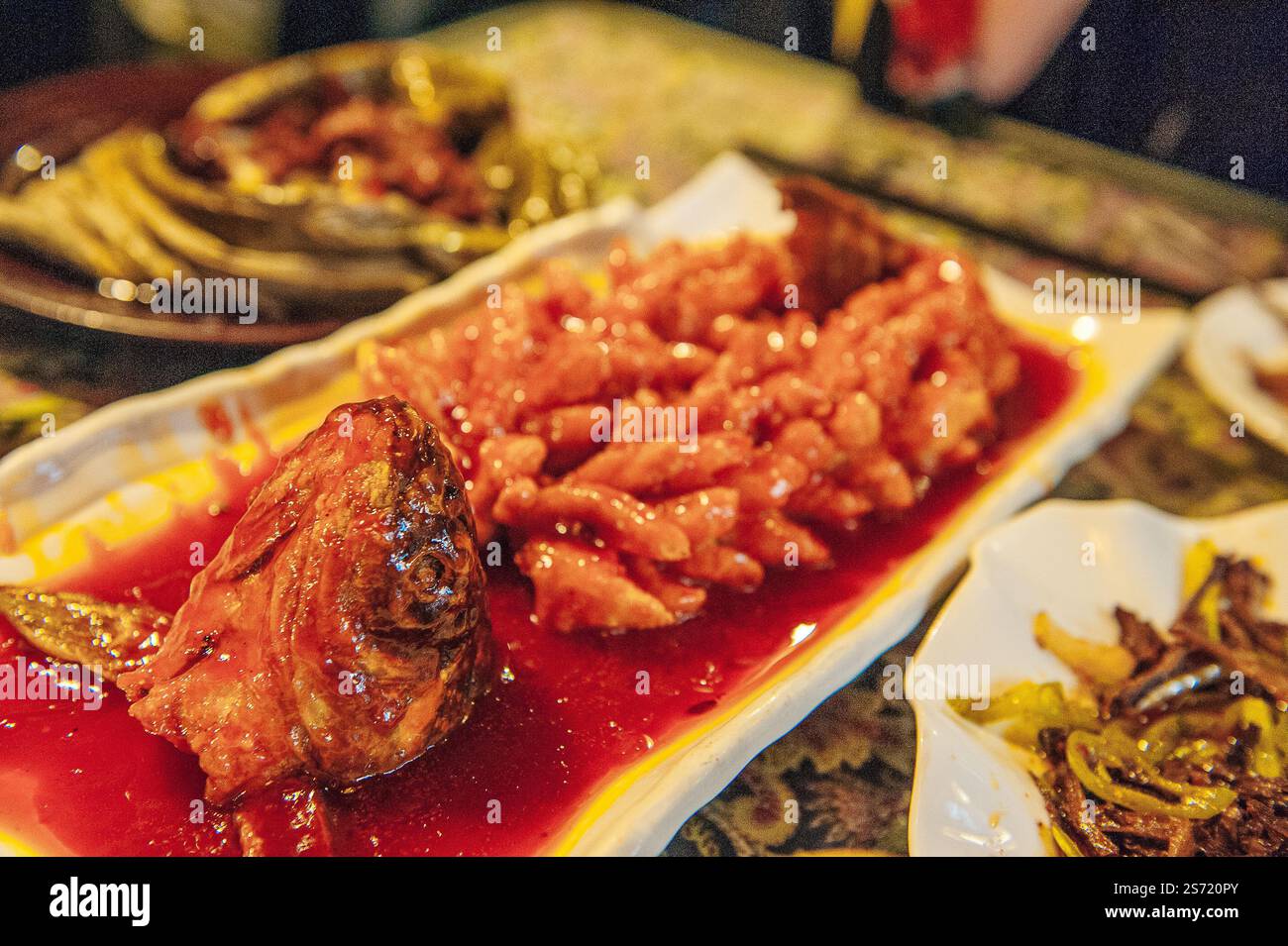 Traditional fish dish served in the Jing Yang Hutong of Beijing. The ...