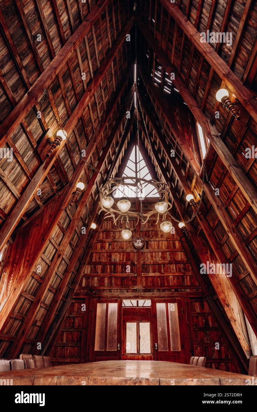 Rustic A-Frame Cabin Interior with Chandelier Stock Photo - Alamy