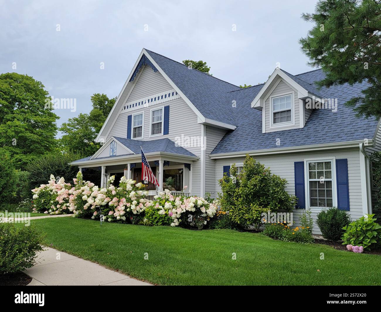 Boutique, Sister Bay, Door County, Wisconsin.  One of many attractive former residences now turned into shops and boutiques. - Smartphone Captured Stock Image