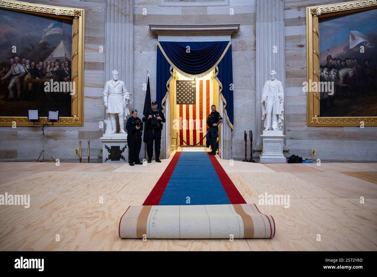 U.S. Capitol Police officers survey the scene in the Rotunda of the U.S ...