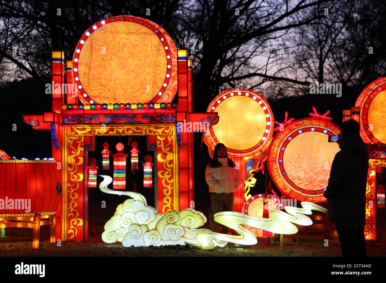 Chengde, China. 18th Jan, 2025. Tourists view Spring Festival lanterns ...