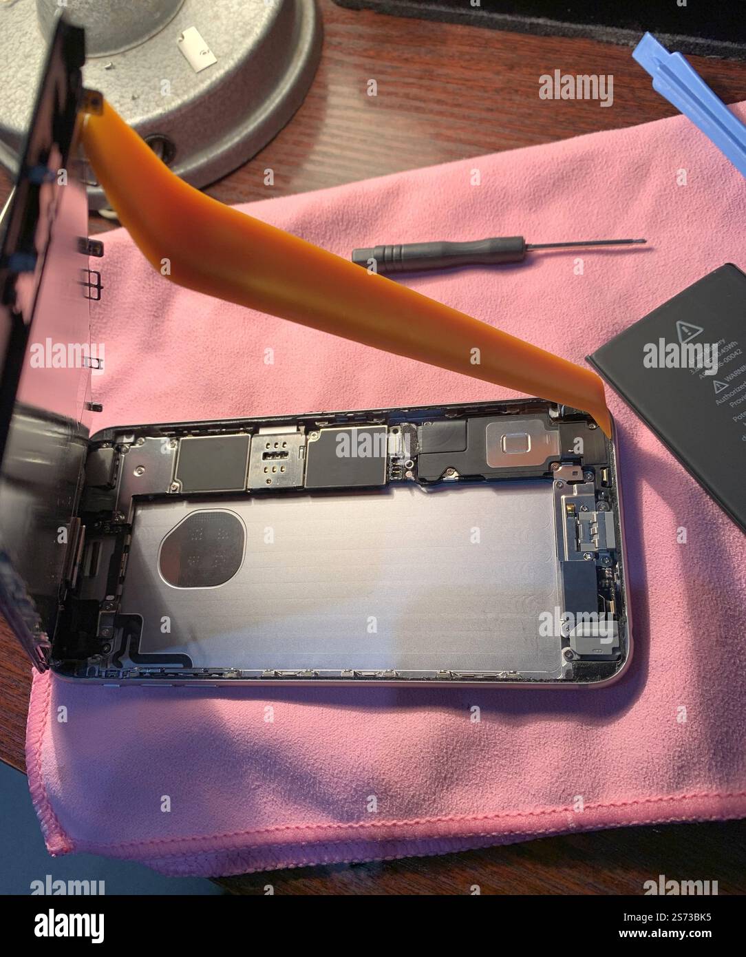 Disassembled smartphone case during repair. Stock Photo