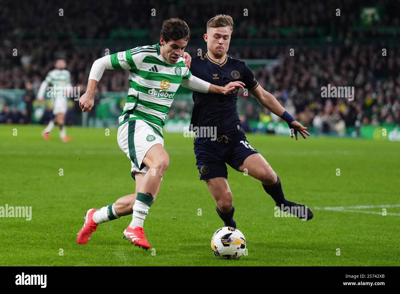 Celtic's Paulo Bernardo (left) and Kilmarnock's David Watson battle for