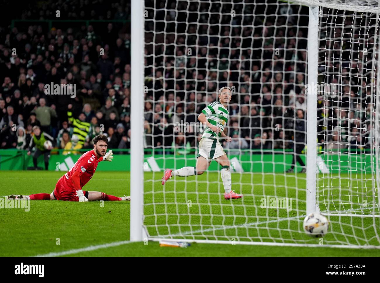Celtic's Daizen Maeda (right) scores his sides second goal during the