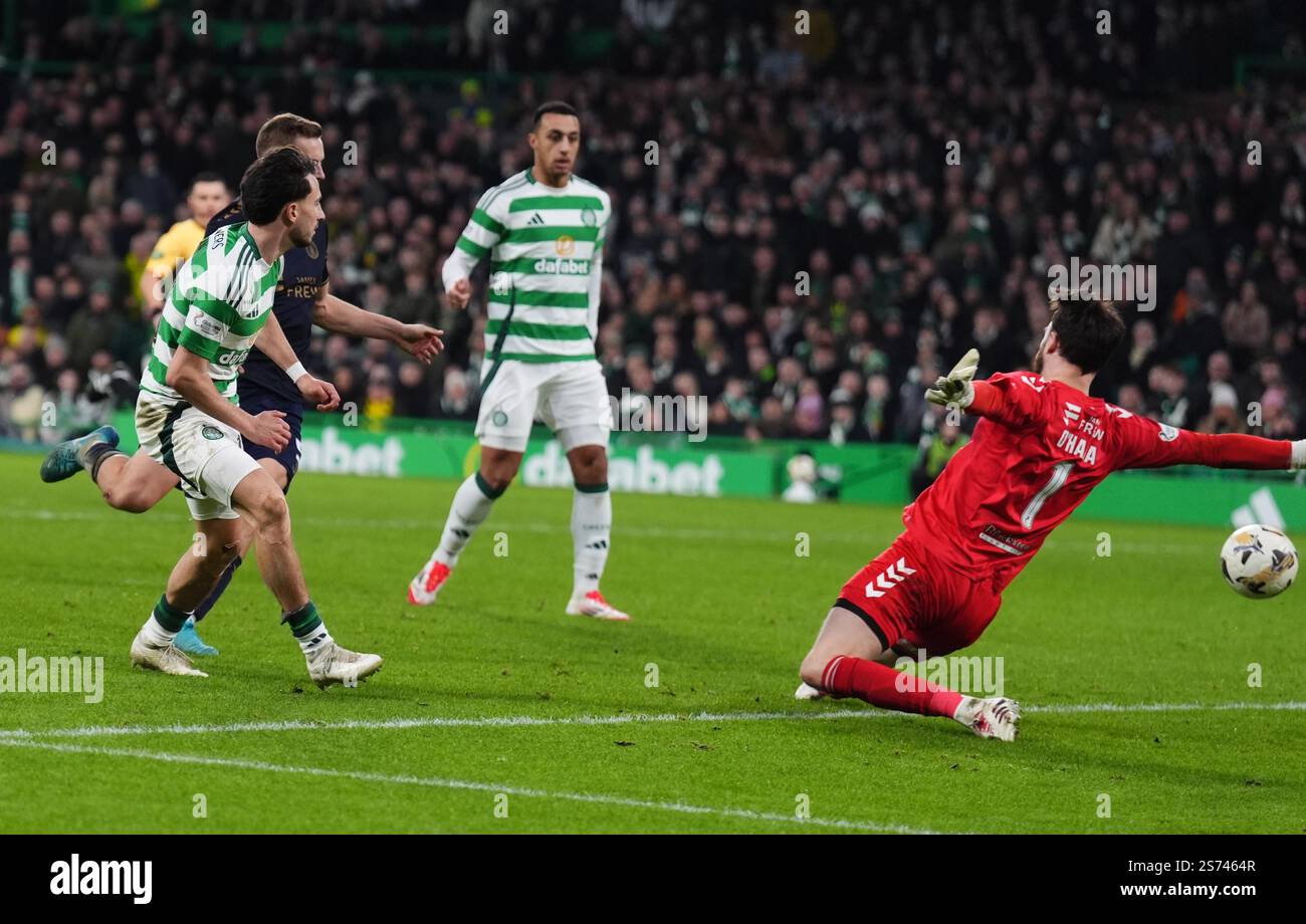 Celtic's Nicolas Kuhn (left) shots wide during the Scottish Gas Men's