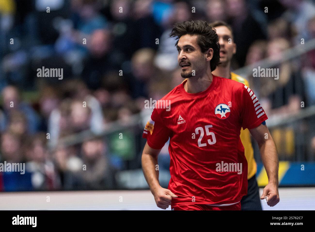 250118 Joshua Mesias of Chile celebrates during the 2025 IHF World Men