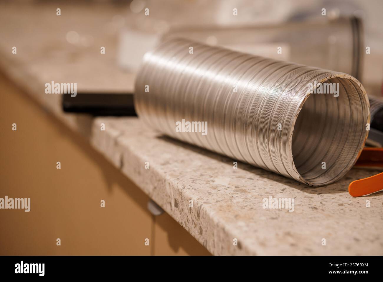 Metallic Cylinder on a Kitchen Countertop Stock Photo - Alamy