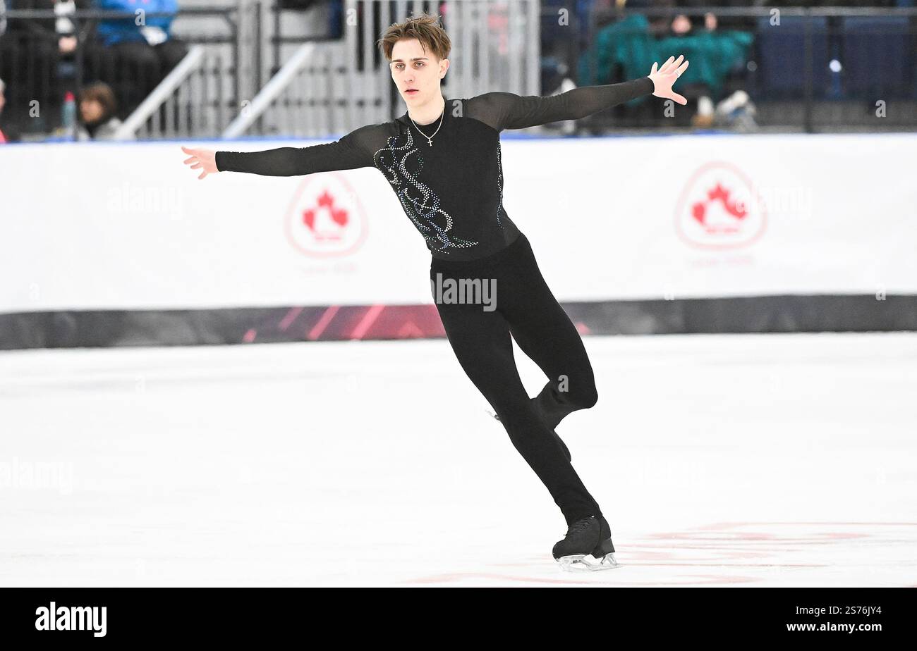 Roman Sadovsky performs his free program in the men's competition at