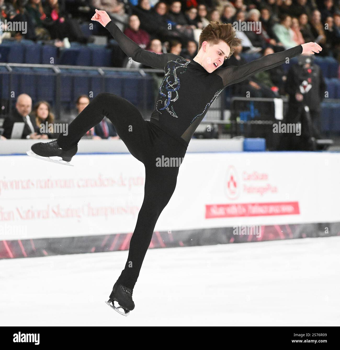 Roman Sadovsky performs his free skate program in the men's competition