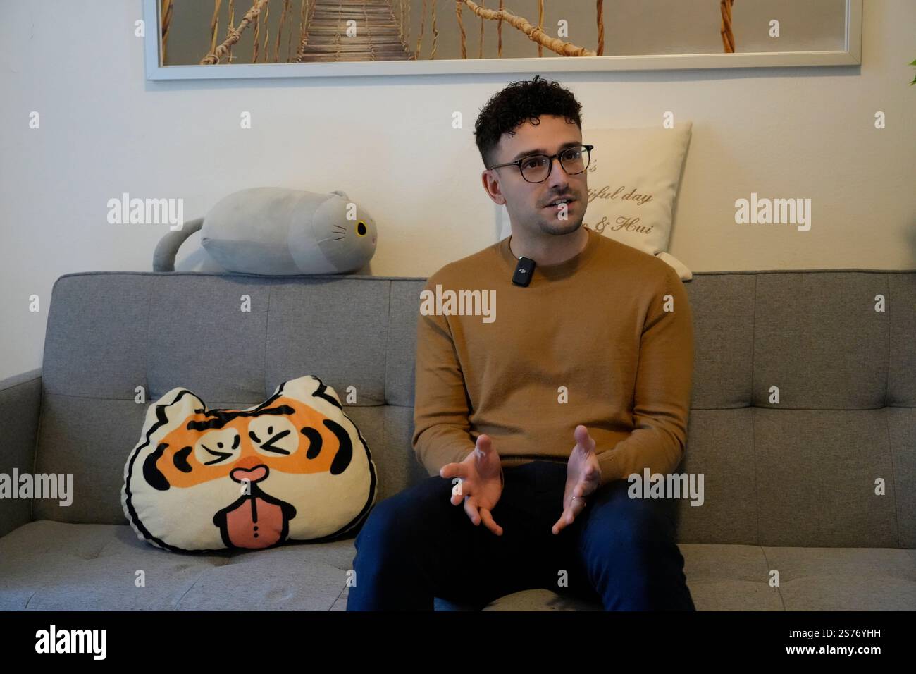 Florence, Italy. 17th Jan, 2025. Giacomo Bechini speaks during an interview with Xinhua at home in Florence, Italy, Jan. 17, 2025. TO GO WITH 'Feature: Italian man embarks on first Chinese Spring Festival journey' Credit: Ren Yaoting/Xinhua/Alamy Live News Stock Photo