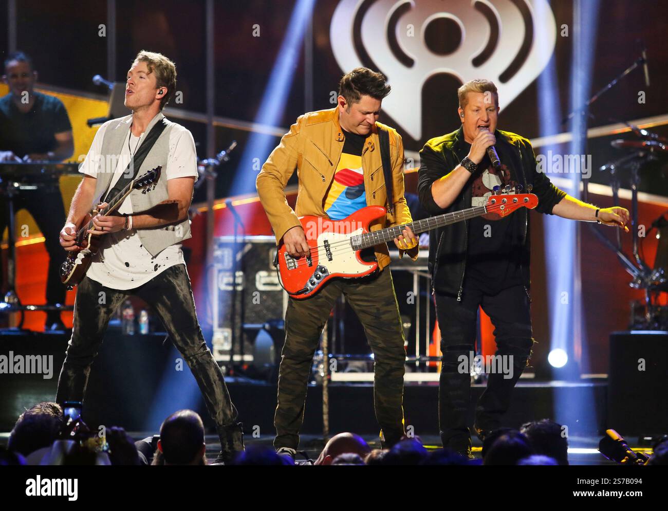 FILE - Rascal Flatts' Joe Don Rooney, from left, Jay DeMarcus and Gary ...