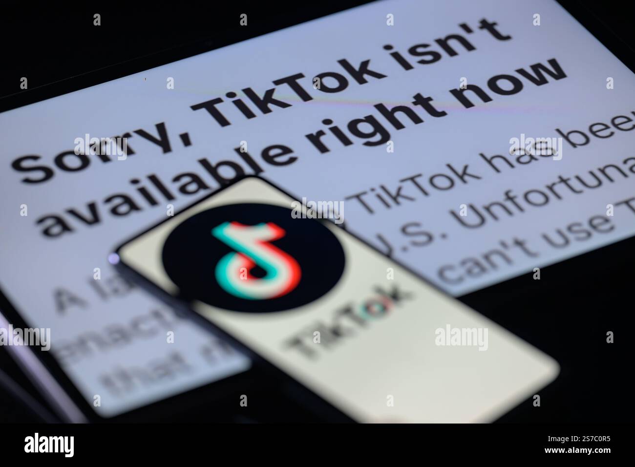 TikTok logo displayed on a mobile screen with TikTok ban massage on