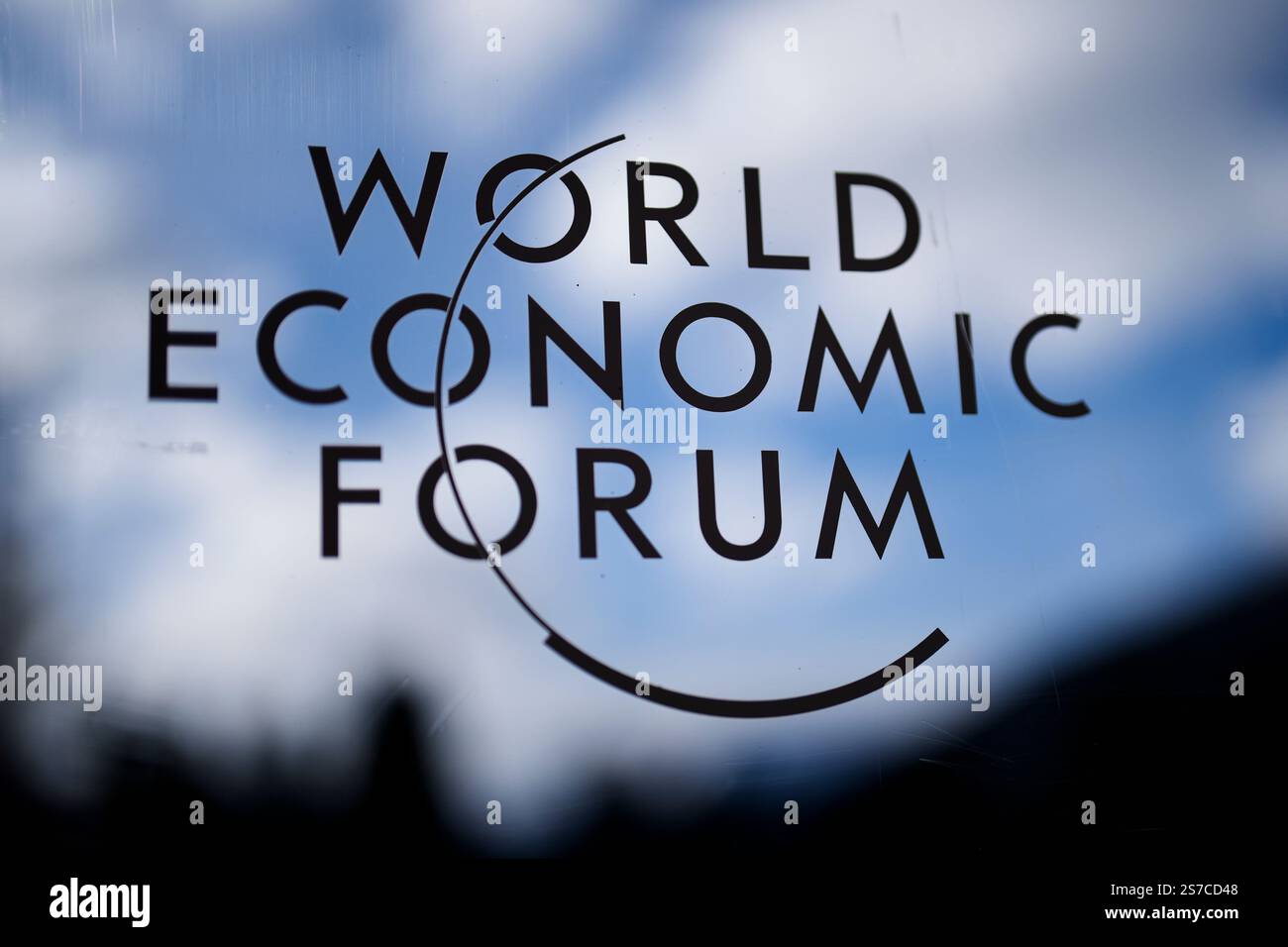 The logo of the World Economy Forum is displayed on a window at the ...