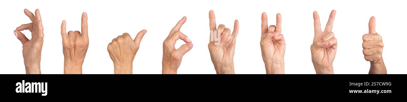 Elderly female hand displaying gestures such as peace, victory, rock ...