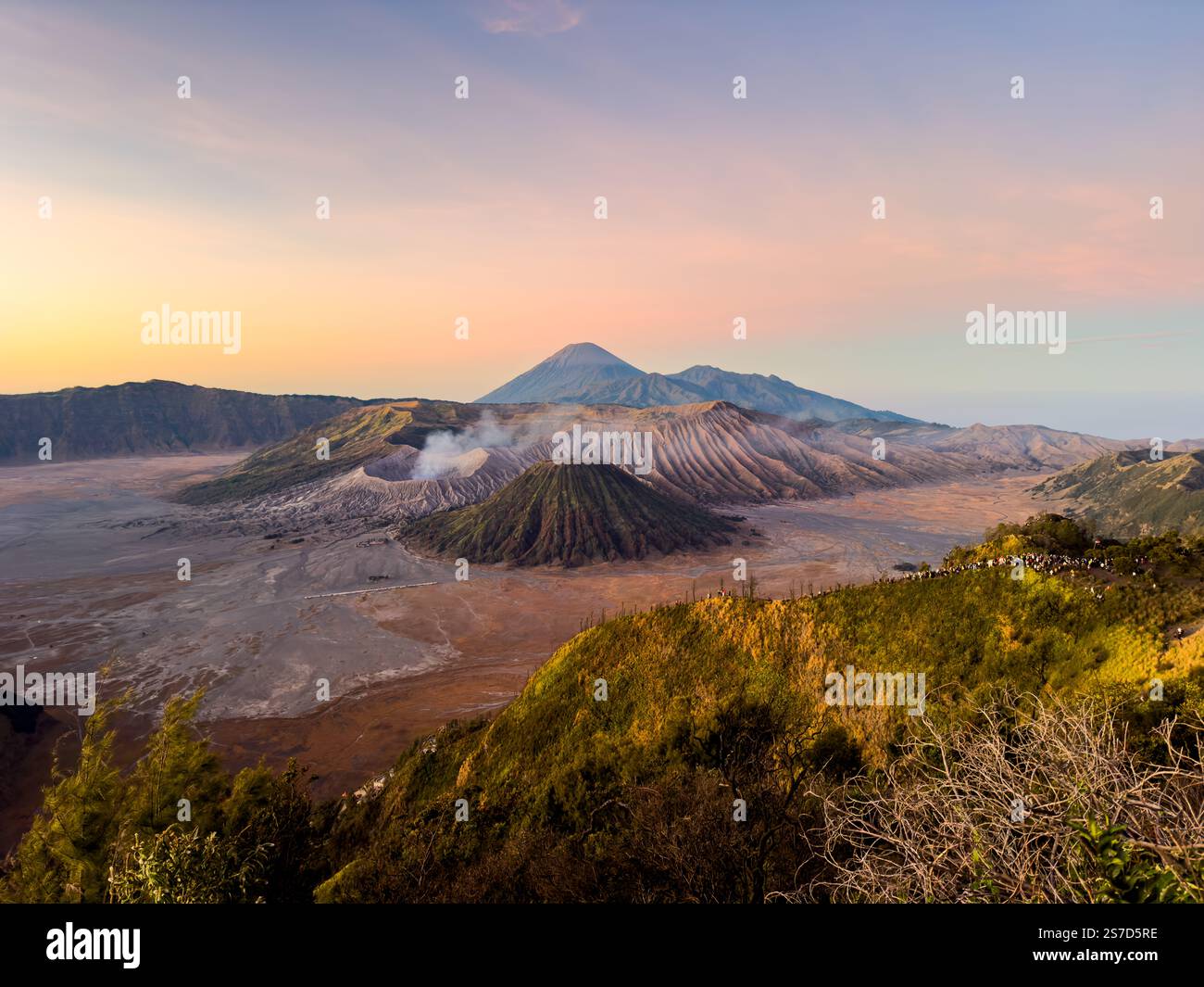 Aerial view of the smoking craters and the scenic beauty of the Bromo ...