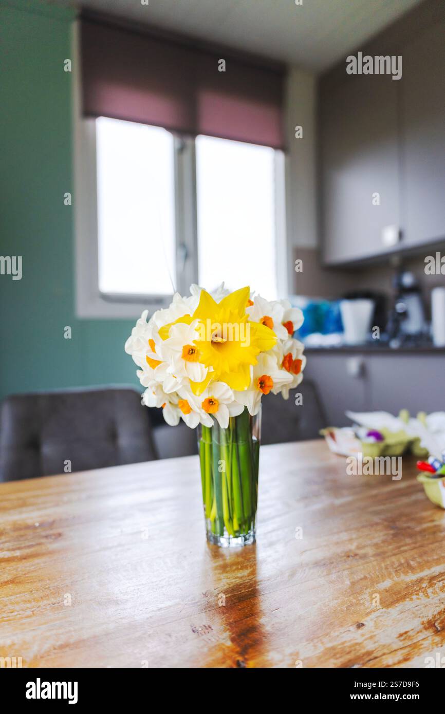 Daffodils on the Easter table 1 Stock Photo
