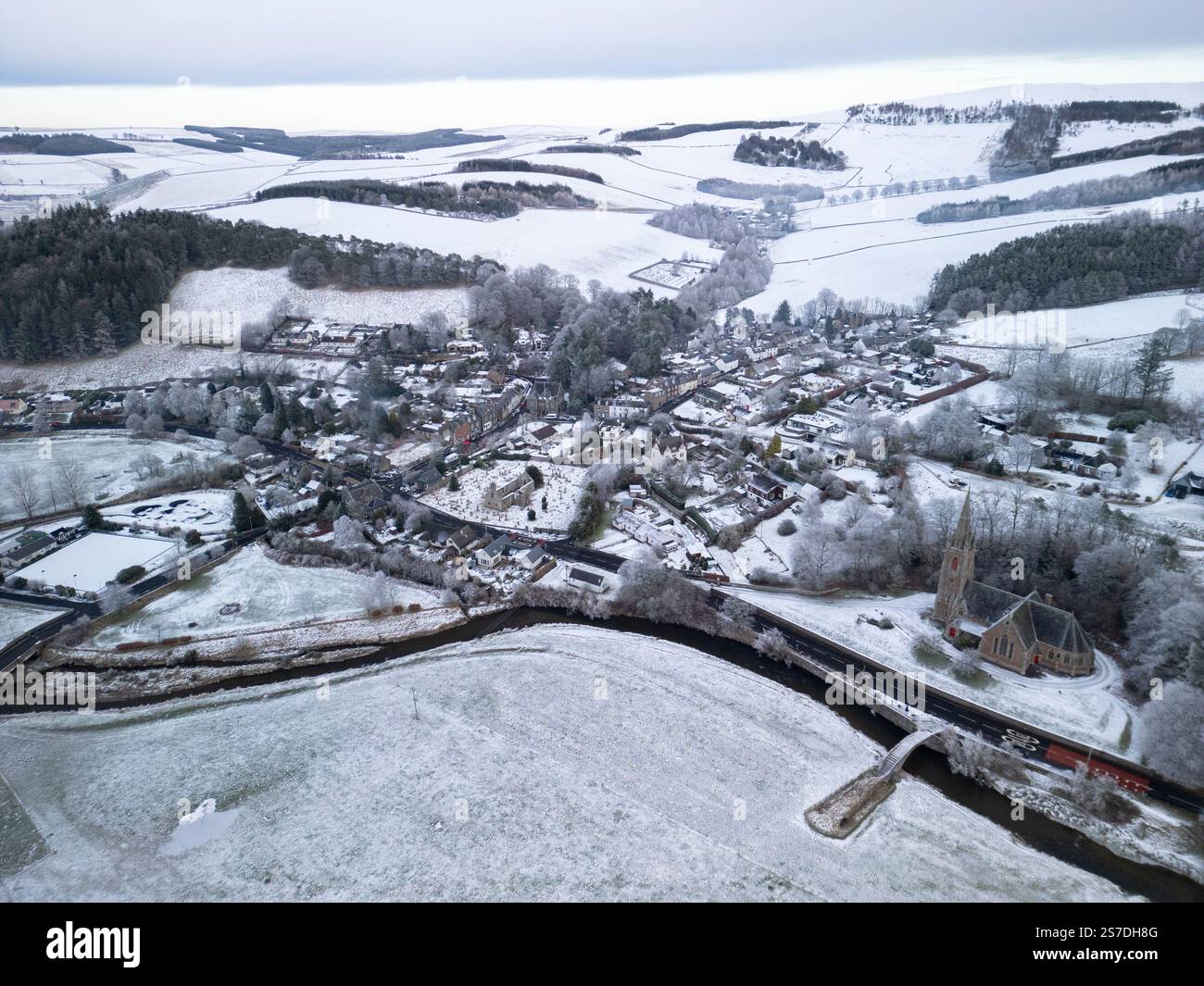 Aerial view of village of snow covered Stow in Scottish Borders in ...