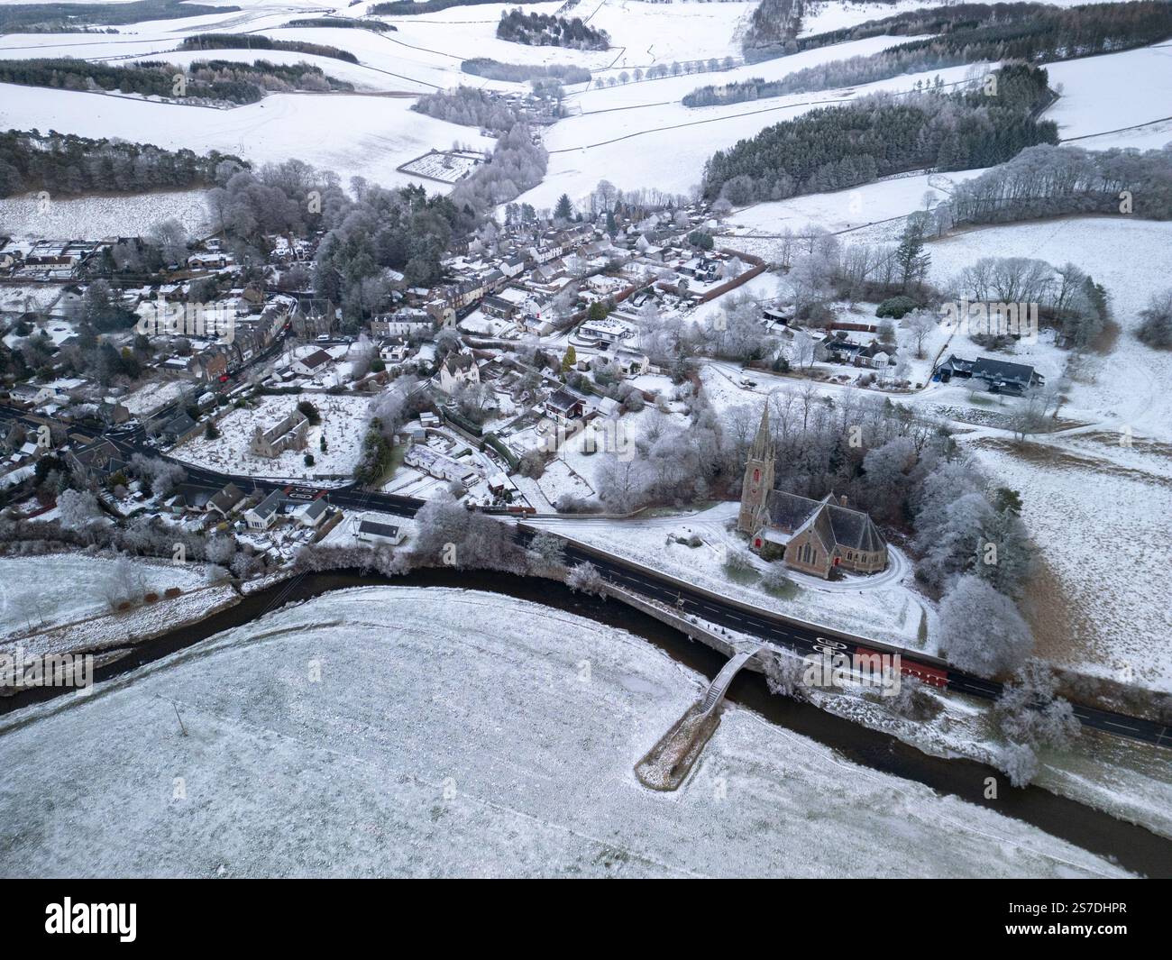 Aerial view of village of snow covered Stow in Scottish Borders in ...