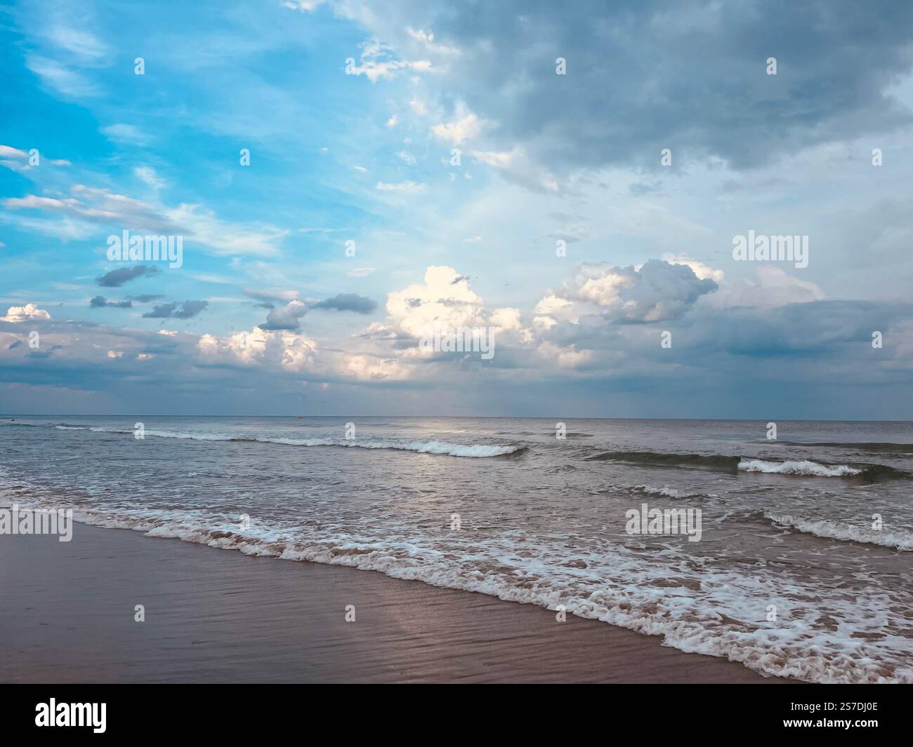 Watching the soothing ocean waves. - Smartphone Captured Stock Image