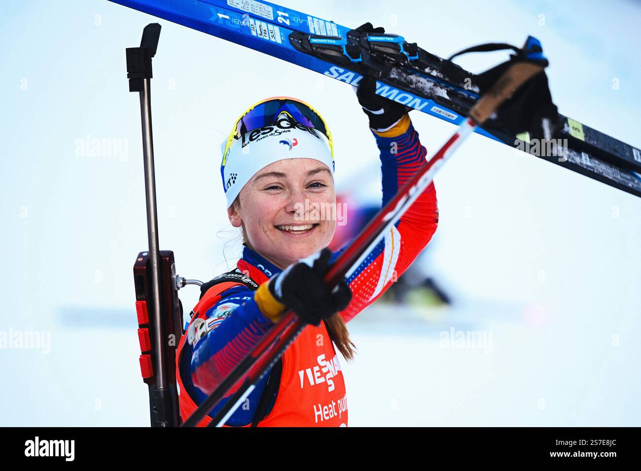 Jeanne Richard from France cheers in the finish area after completing ...