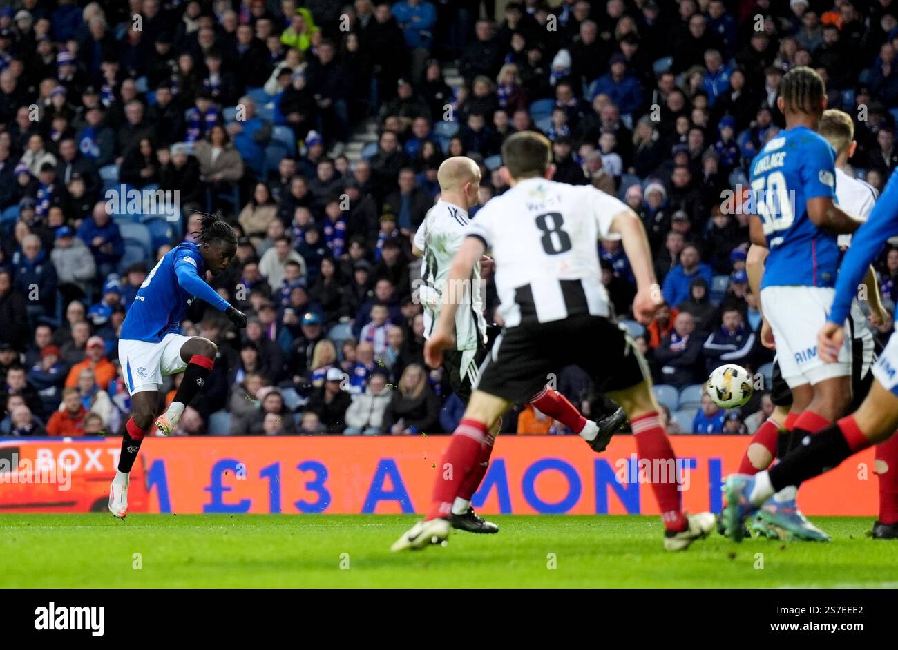 Rangers' Clinton Nsiala (left) scores his sides second goal during the