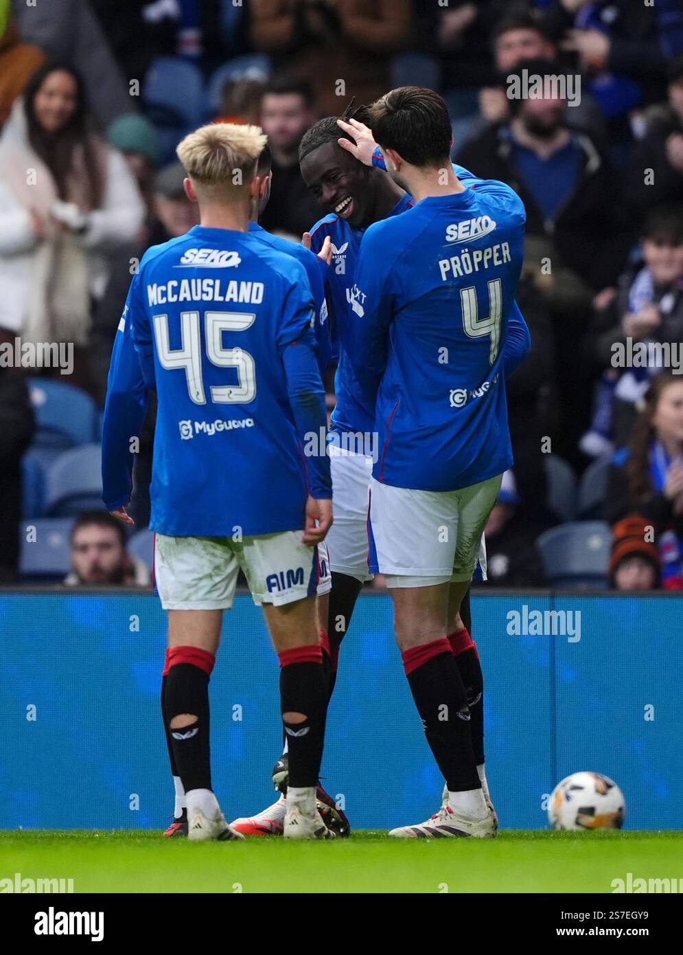 Rangers' Clinton Nsiala (centre) celebrates with his team mates after