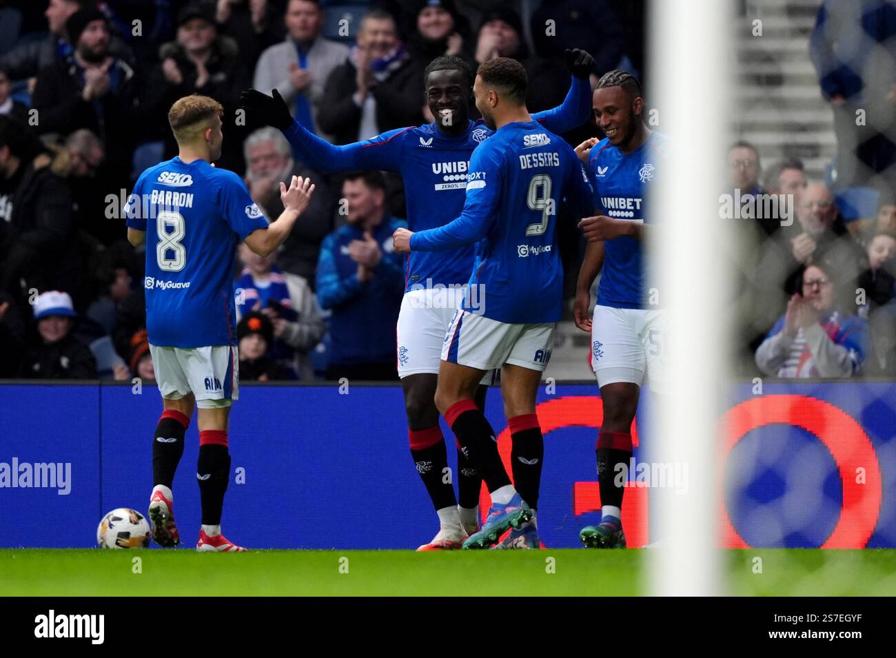 Rangers' Clinton Nsiala (second left) celebrates with his team mates